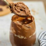 vegan chocolate mousse in a glass cup.