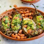 stuffed jalapenos in a mexican plate.