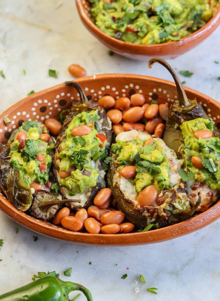 stuffed jalapenos in a mexican plate.