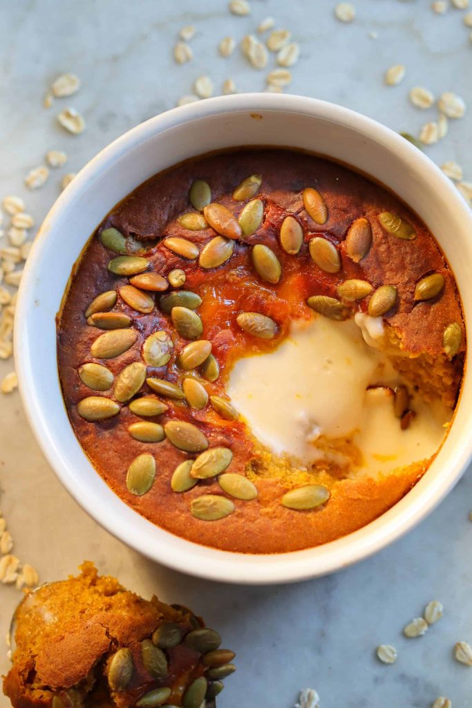 baked pumpkin oats in a ramekin.