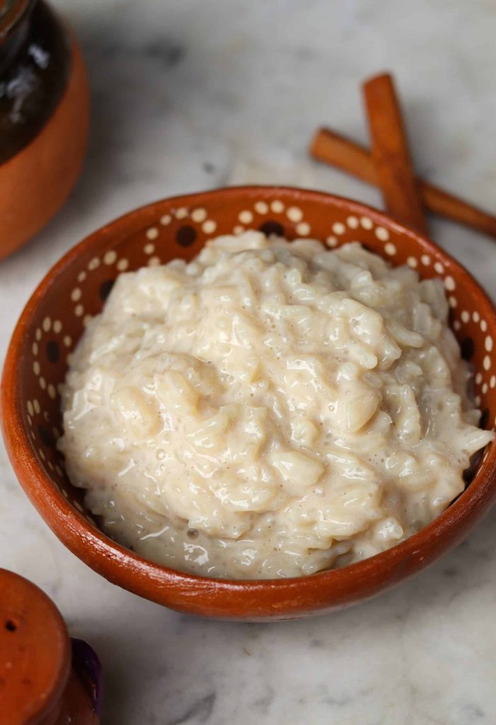 Vegan Arroz con Leche in a small mexican dish.