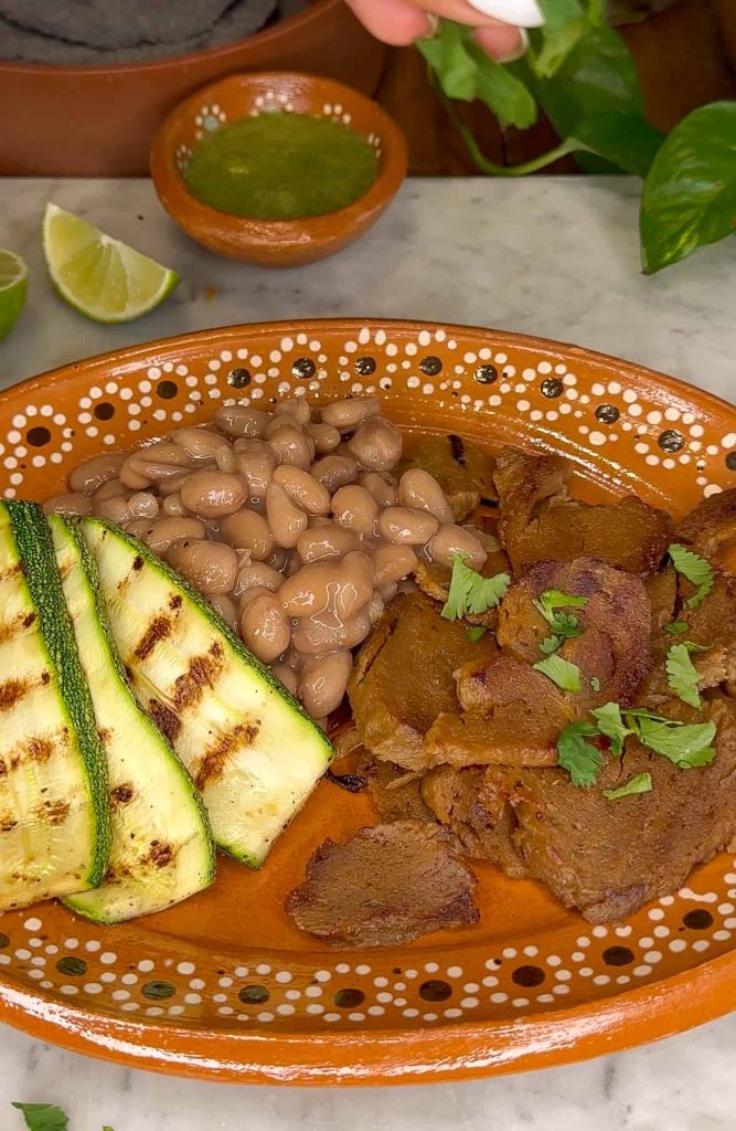 vegan carne asada on a mexican plate.