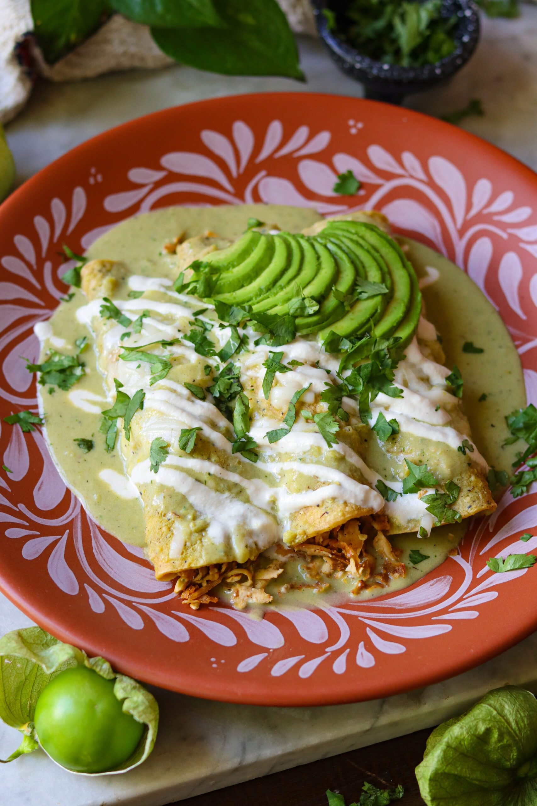 vegan enchiladas verdes in a mexican dish.