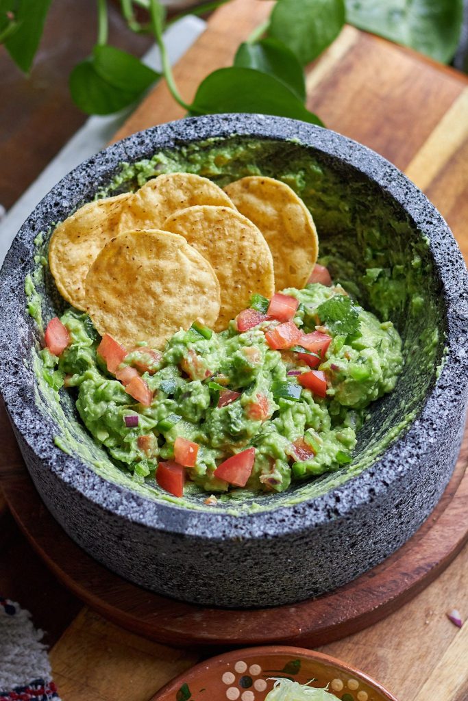 guacamole in a molcajete.